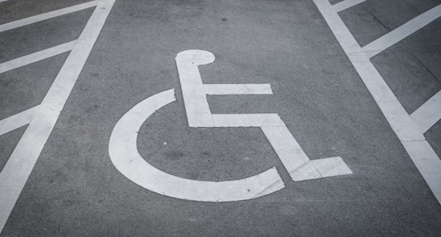 Symbol of disabled person on the street