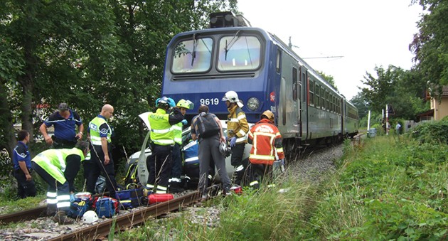 A train accident on the track with some people